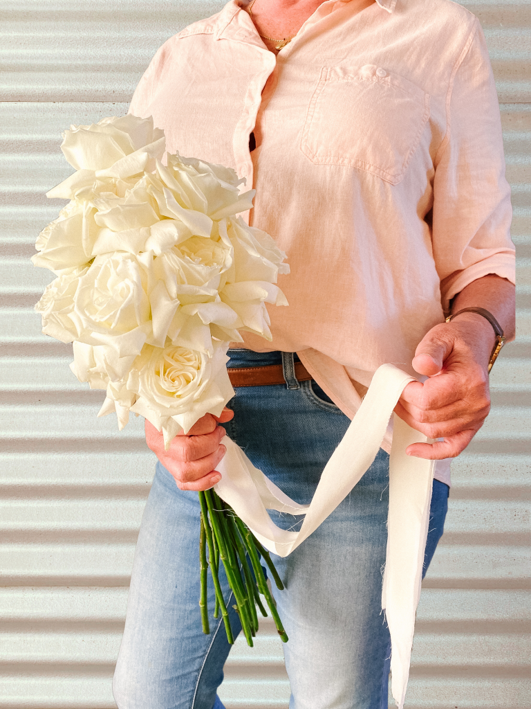 Beautiful wedding bridal bouquet using classic long-stem white roses. Designed by Tania Guest, local florist from The Seasonal Bunch in Happy Valley, SA