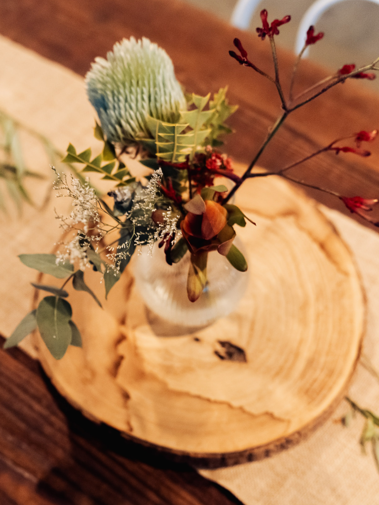 A beautiful wedding table centrpiece using native local flowers. Designed by Tania Guest, local florist from The Seasonal Bunch in Happy Valley, SA